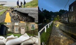 在北约克郡，山洪冲毁了道路，淹没了房屋