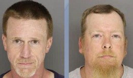 在摩尔县，一名男子用枪指着闯入者射击汽车轮胎，两名男子被捕