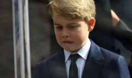 乔治王子的“不对称微笑”预示着他的未来