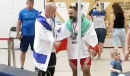 伊朗举重运动员因与以色列运动员握手被终身禁赛